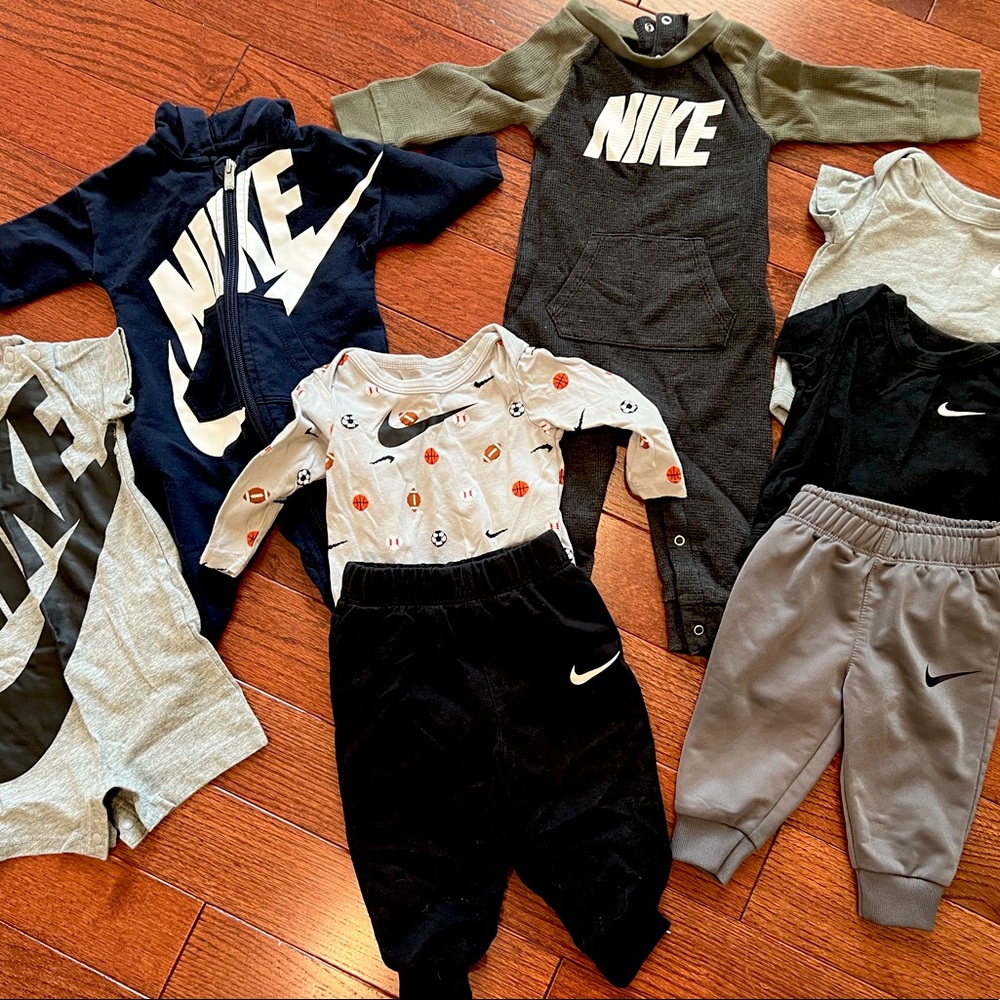 Assorted Nike boy outfits. Size range from 3 months to 12 months